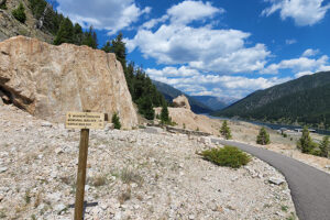 Memorial Boulder at Earthquake Visitors Center, looking towards the east up Quake Lake. Get Lost in America