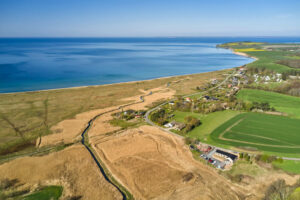 All Inclusive Denmark Fly Fishing Lodge, with Get Lost in America, aerial shot of lodge and Denmark's coastline