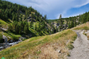 Mystic Falls Trail opens up just below a ridge as you approach the falls