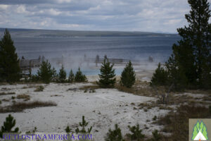 Alkaline soil, geysers and Yellowstone Lake in Yellowstone National Park