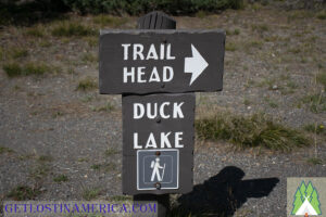 Sign in parking lot by mud pots showing us the way to Duck Lake