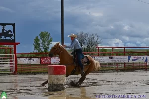 Barrel Racing Montana Rodeo while Fly Fish Montana and stay in a Yellowstone Cabin Rental with Get Lost In America