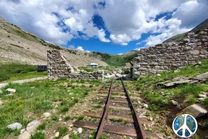 Some of narrow gauge line is still in place, ahead the remains of the Engine repair workshop