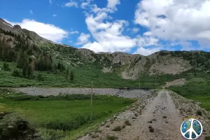 Closed off West Alpine Tunnel Entrance and Engine Round House ahead. Get Lost in America fly fish Italy and fly fish Montana