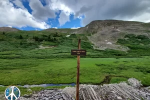 What's Left of the Water Tank built in 1906 backpacking adventure on the Continental Divide Trail with Get Lost in America. Best Choice for Yellowstone Cabin Rentals and Fly Fish Montana