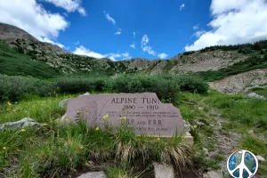 Broken granite marker for West Alpine Tunnel, it was used from 1880 to 1910 for tourist and ore in Hancock, Colorado. Continental Divide Trail Alternate. Hiking with Get Lost in America the best decision for Fly Fish Montana and Yellowstone Cabin Rentals