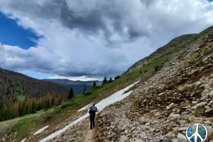 Colorado Through hiker I hiked out with. Still quite a bit of snow here and there for the first weekend in August.