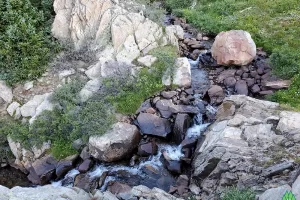 I am looking down into the mini gorge of the Frying pan River below Independence Lake hiking to Lost Man Lake for some Colorado Fly Fishing for Cutthroat with Get Lost in America | Saltwater on the fly