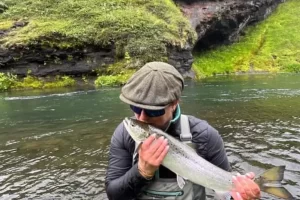 Showing Gratitude by kissing an Atlantic Salmon before release with Get Lost in America | Saltwater on the Fly