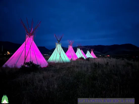 Lite Teepees at the Roosevelt Arch the North Entrance to Yellowstone Park at Gardiner Montana