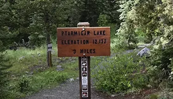 Discover the beauty of central Colorado Hike Ptarmigan Lake Trail Colorado, a scenic hike with stunning views and fishing spots. Get Lost in America
