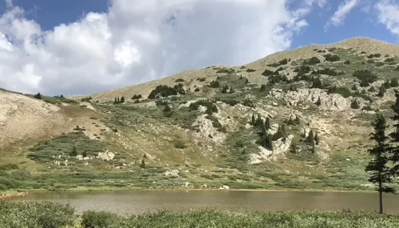 Embark on an unforgettable Hike Tunnel Lake Colorado. Explore stunning alpine scenery, historic remnants, a lake in the heart of the Rockies. Get Lost in America on the Continental Divide and Colorado Trails.