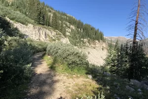 At around a mile and half the trail opens up. Tunnel Creek flows though the valley below. Get Lost in America.