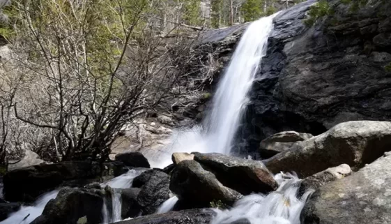 Our guide covers a hike Bridal Veil Falls, McGraw Ranch's history in Rocky Mountain National Park, and essential tips.