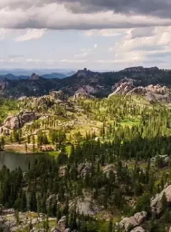 Custer State Park and Mount Rushmore National Memorial. Experience wildlife, scenic drives, American history in South Dakota's Black Hills.