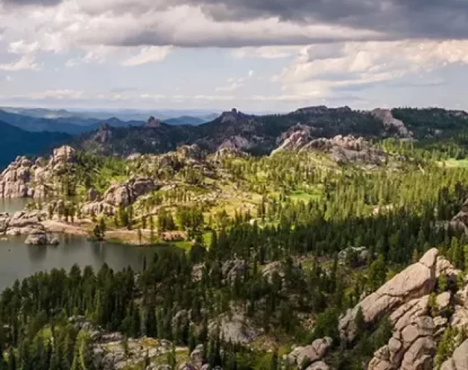 Custer State Park and Mount Rushmore National Memorial. Experience wildlife, scenic drives, American history in South Dakota's Black Hills.