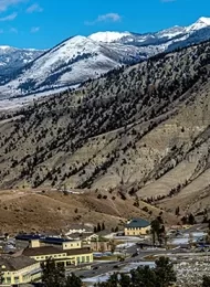 Explore the rich history of Fort Yellowstone, from its U.S. Army origins to its role as a National Historic Landmark in Yellowstone National Park.