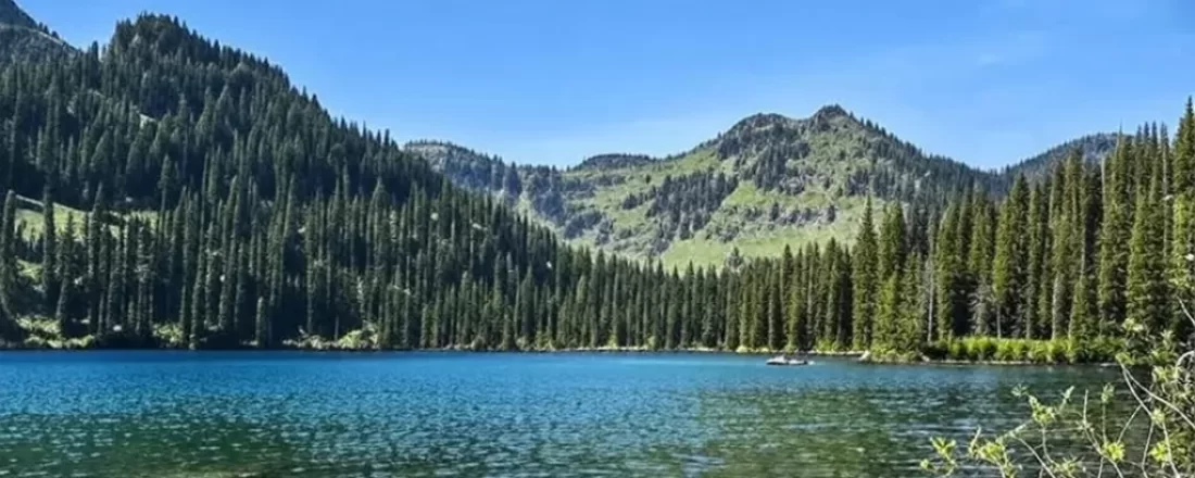 Discover the stunning Mission Mountains Wilderness in Montana. Find info on hiking trails, fly fishing spots, history, and practical tips.