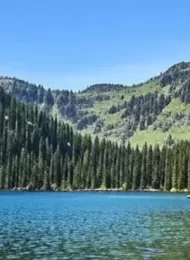 Discover the stunning Mission Mountains Wilderness in Montana. Find info on hiking trails, fly fishing spots, history, and practical tips.
