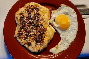 Sourdough Starter Breakfast Fry Bread in Pan with Taco Meat & Everything Bagel on Plate with Fried Egg
