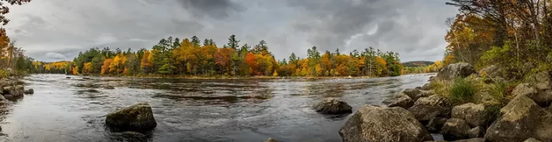 DIY fly fishing the Penobscot River trip. Find the best spots, flies, and gear for landlocked salmon and trout.