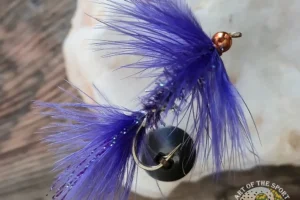 Hot Purple Woolly Bugger tied with Ewing Hackle Marabou Body Chickabou.