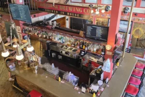 Firehouse Brewing-Badlands National Park- 1. 3 Bar from upstairs seating looking down I hope